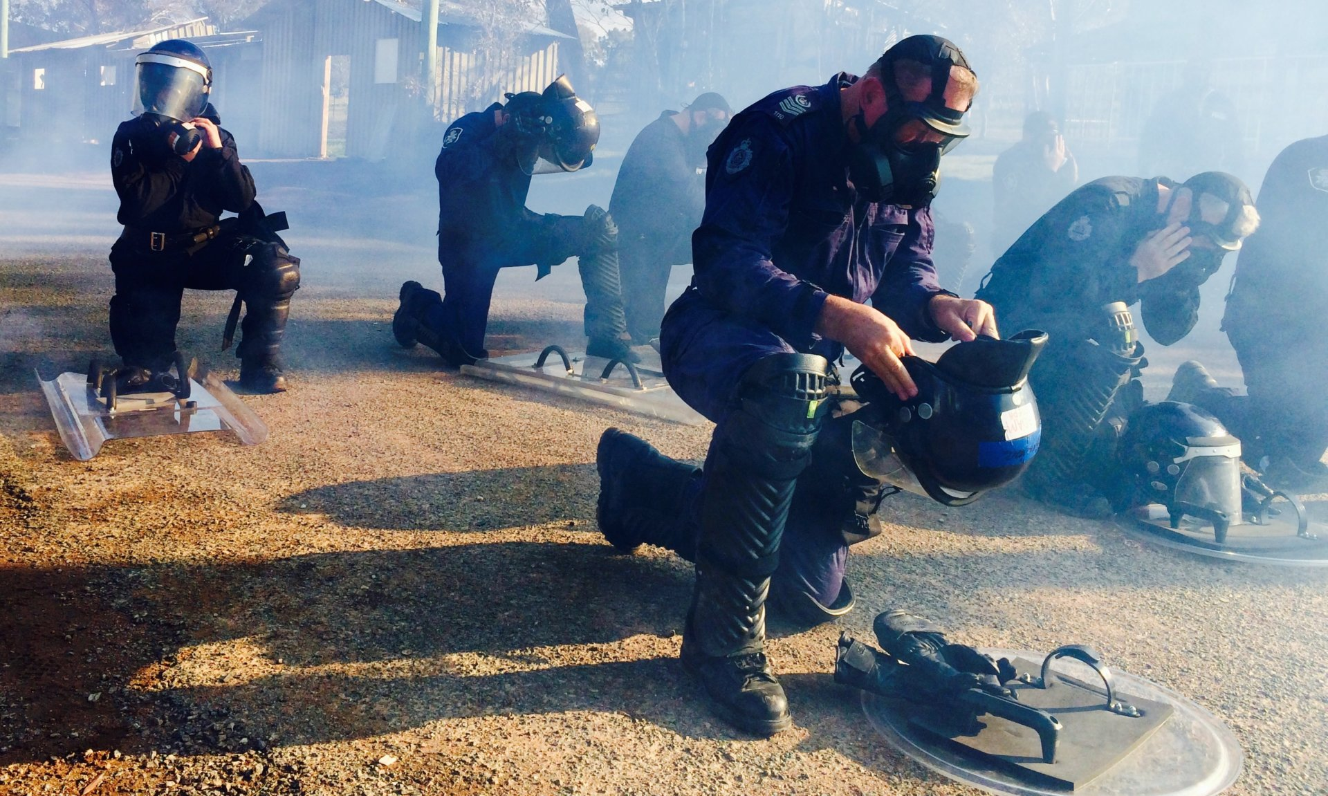Police - taking the knee? Or preparing  for conflict?